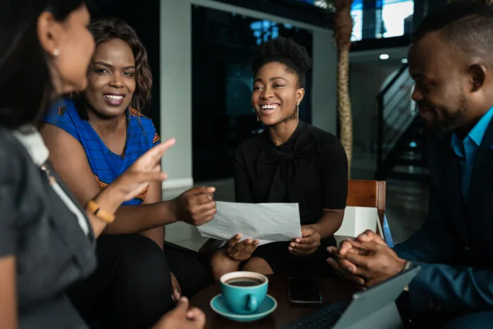 Business-people-smiling-700x467